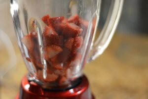 Place Strawberries and Granulated Sugar in Blender, creamy strawberry mousse dessert