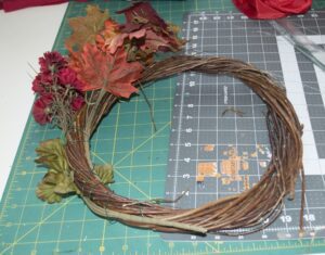 add-silk-flowers-to-wreath Add Silk Flowers to Wreath, 5 Minute Autumn Wreath