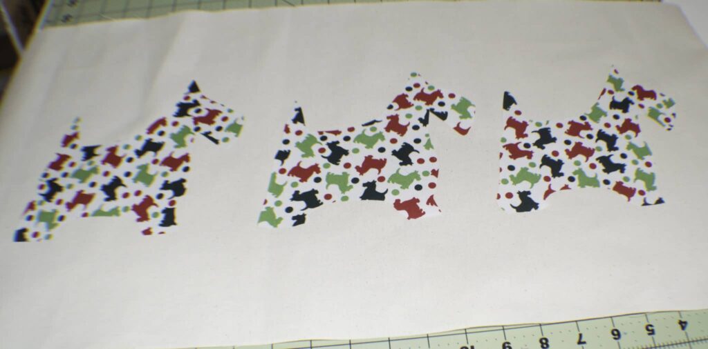 Fuse the Scotties to the Utility Fabric Christmas Applique Pillow
