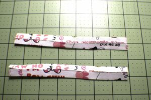 Fold the long sides into the Center How to Sew a Drawstring Easter Bunny Bag