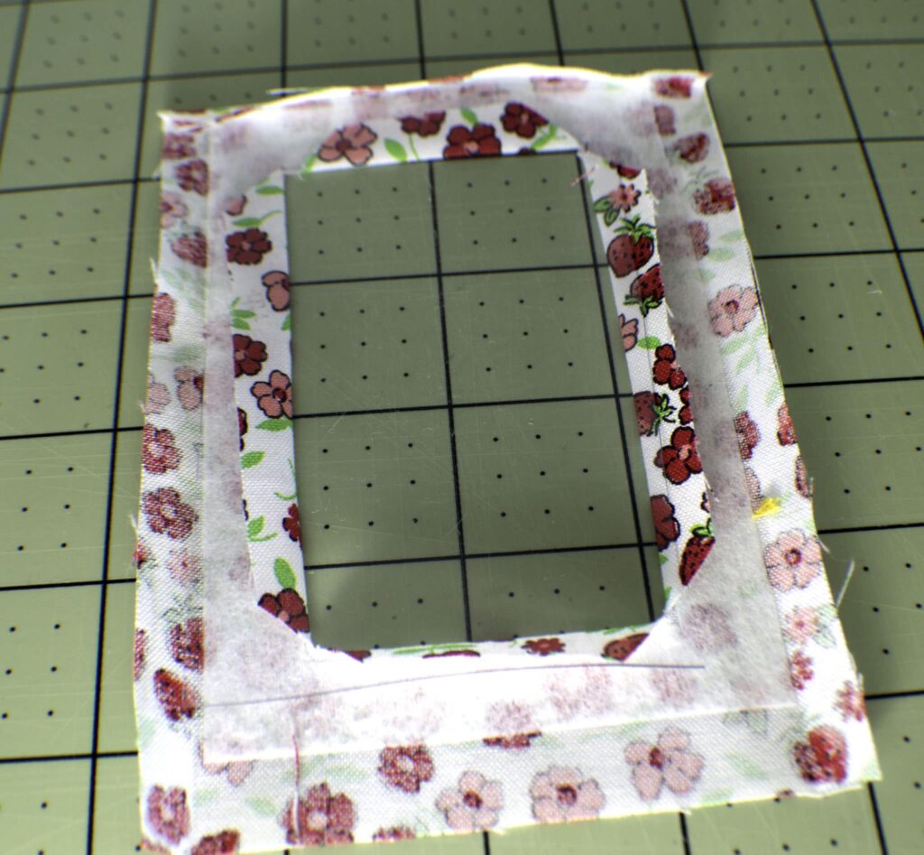 Place the clear vinyl over the folded pocket piece interior How to sew DIY Luggage Tags