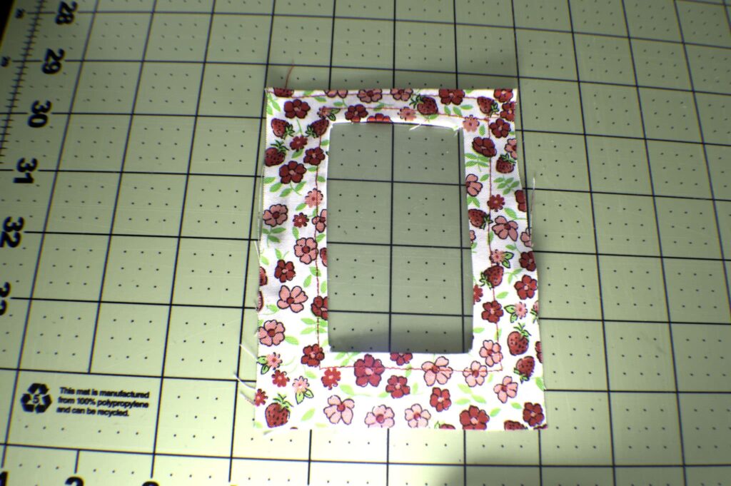 Top stitch the vinyl to the interior of the pocket piece How to sew DIY luggage tags