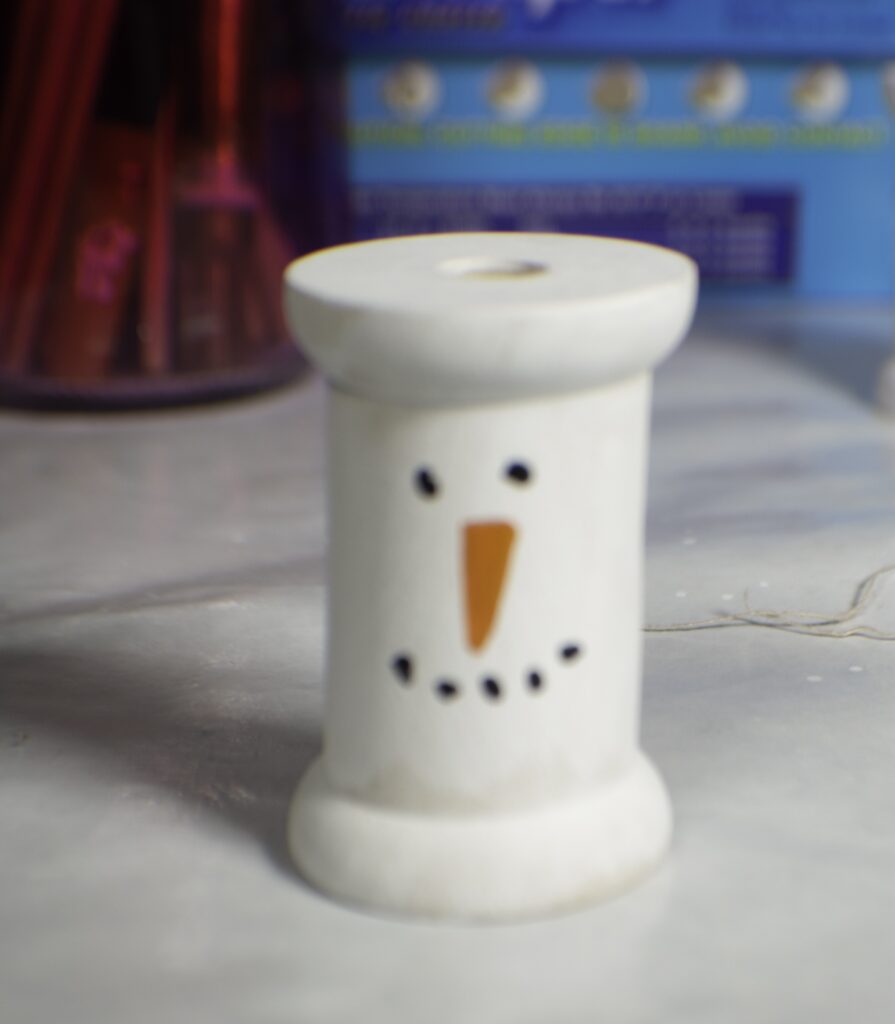 Make a hanging snowman ornament
