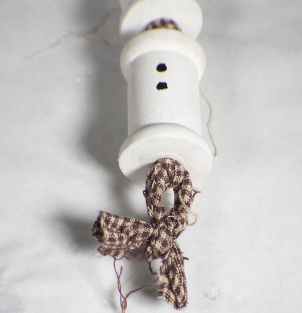 Make a hanging snowman ornament