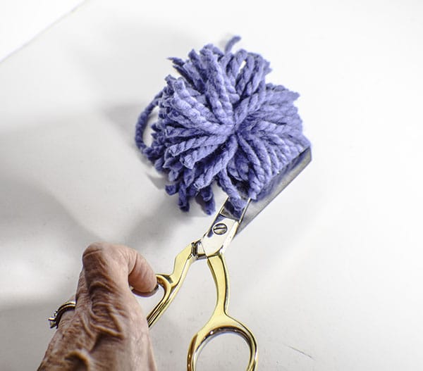 How to make a drop cloth pom pom throw