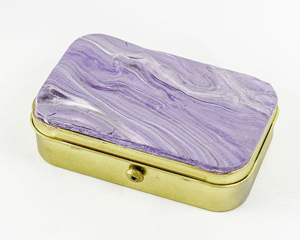 Make an altoids tin mini clutch